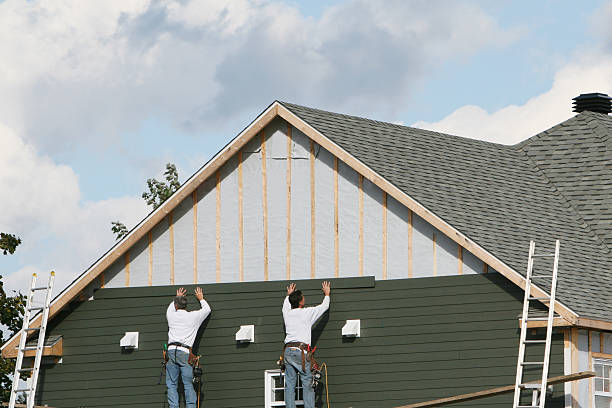 Professional Siding Installation technician working in Riverdale, MD